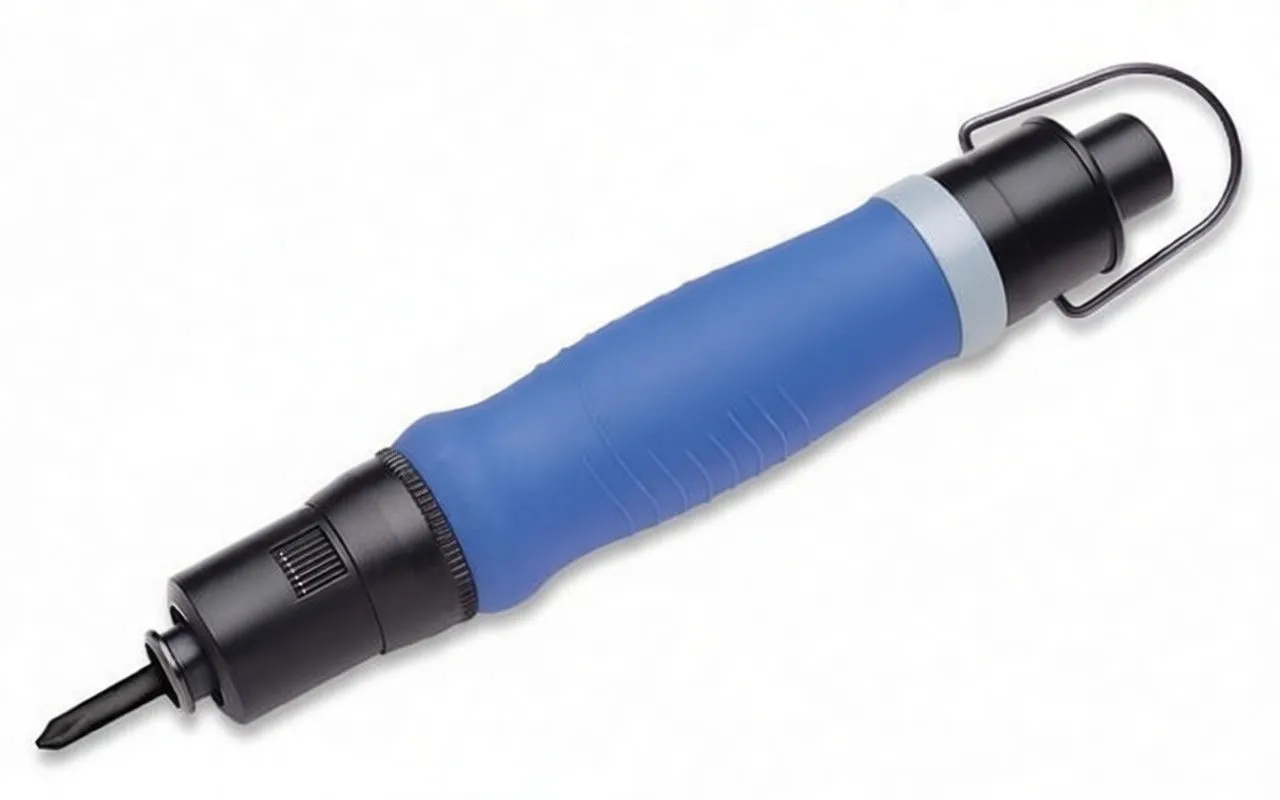 Pneumatic screwdriver with colored protective caps, spare bit and brass air fitting on white surface