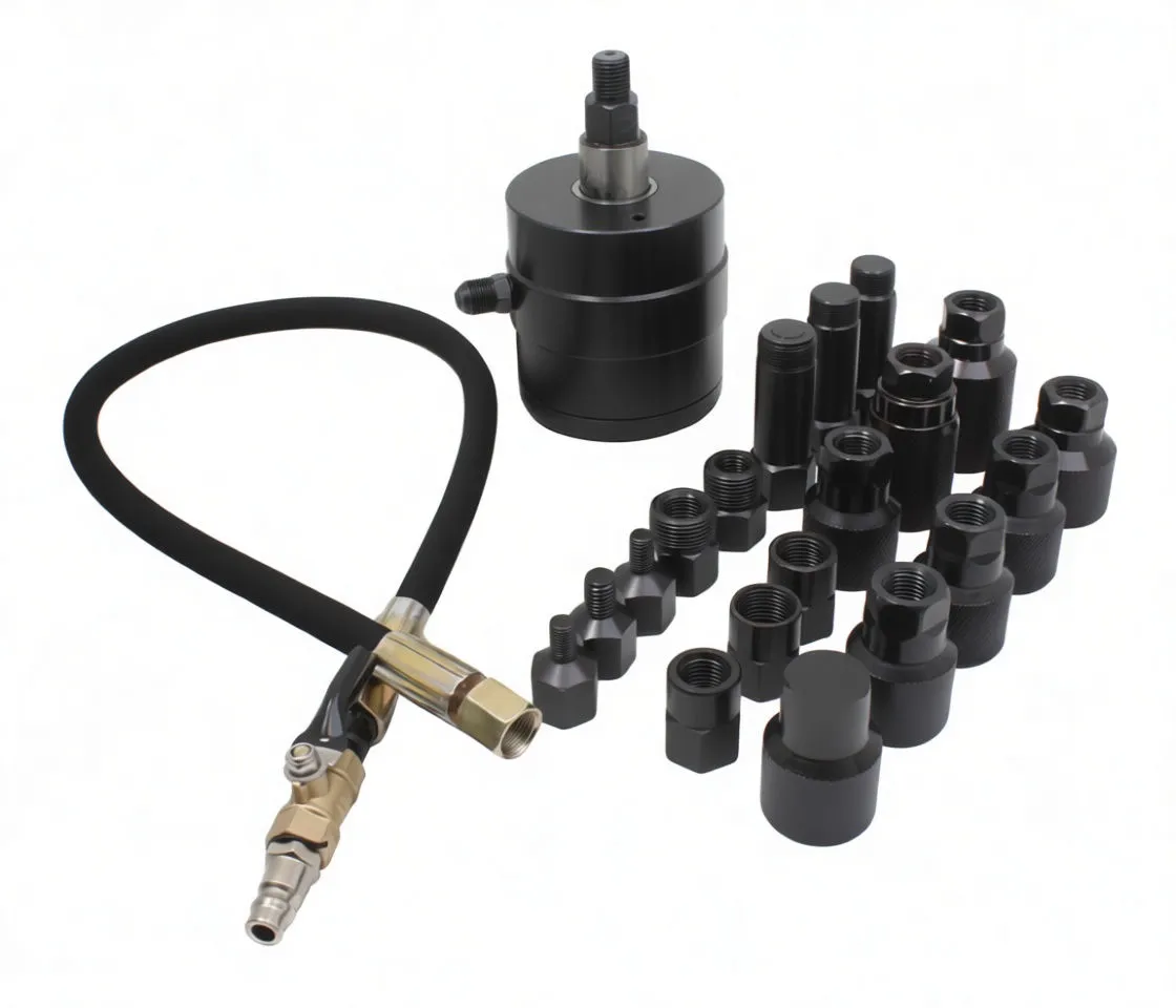 Pneumatic vibrator unit, rubber air hose with brass valve, and a spread of threaded extractors and adapters on white background.