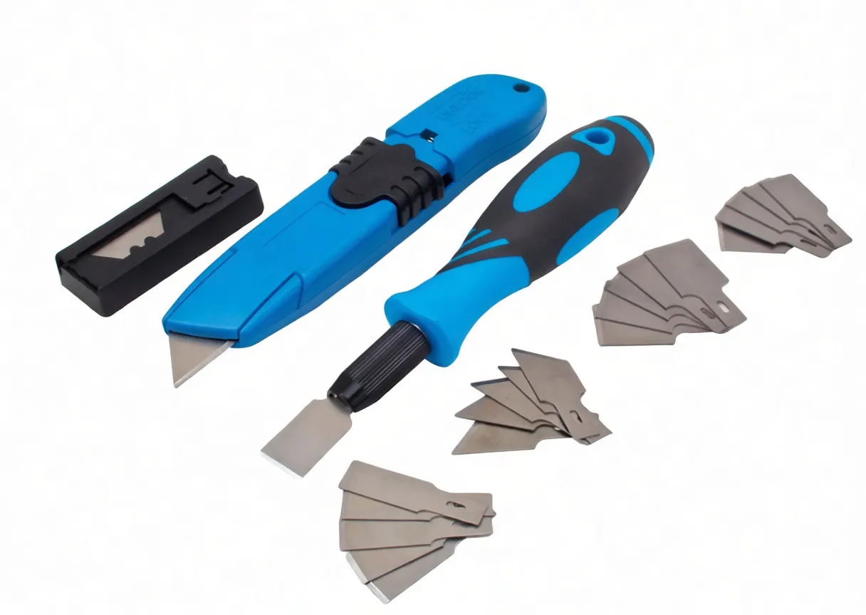 Close view of utility knife, scraper handle, blade box and groups of spare blades with branding visible