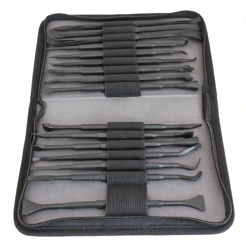 Flat view inside pouch with multiple black plastic pry, scraper and hook tools held by elastic loops