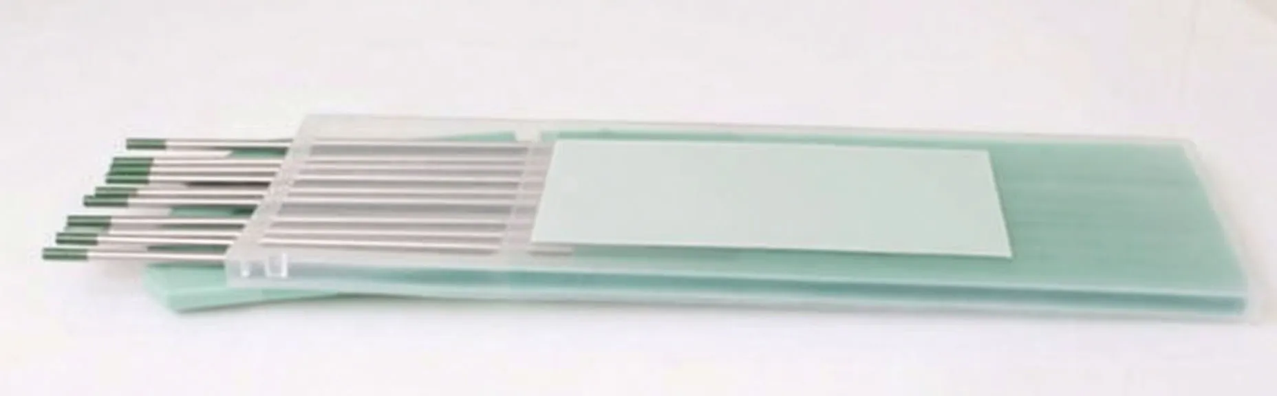Side view of plastic sleeve of tungsten electrodes with green tips and visible saTra WP/GREEN24 label