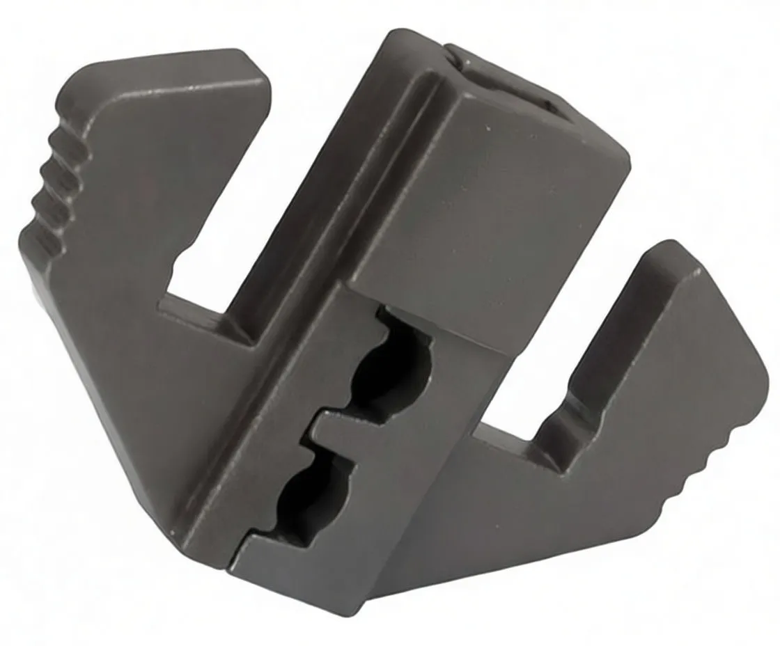 Close-up of dark steel crimping die insert with three cavities and yellow, blue and red dots