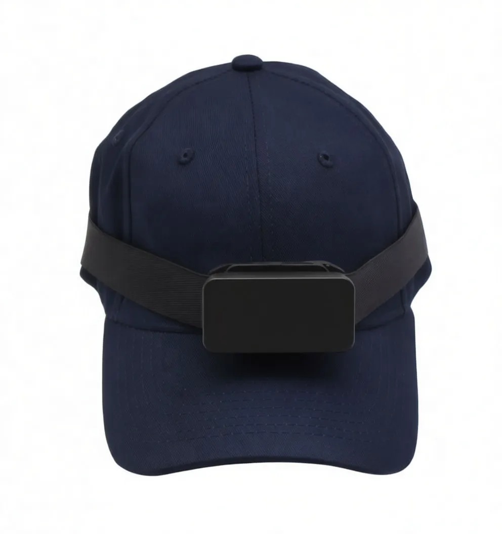 Close-up of headlamp rear showing hinged magnetic clip open, side charging/status icon and ASTA label