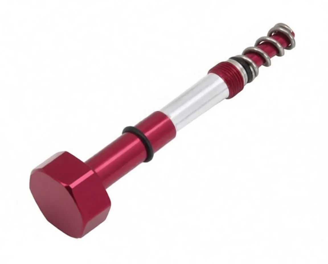 Vertical close-up of red-and-silver mixture screw adjuster showing needle tip, spring, threaded collar, shaft logo and numbered knob