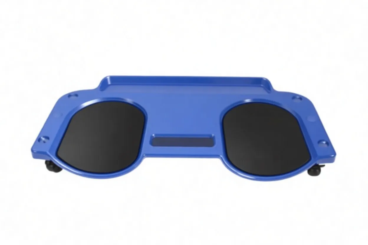 Top view of blue rolling knee pad showing two black knee cushions, central handle, recessed sticker, and molded tool tray areas.