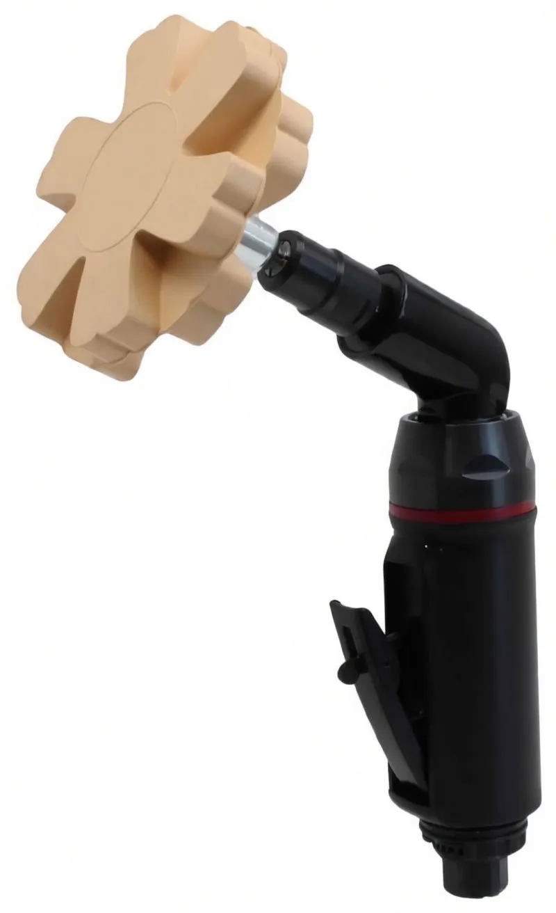 Rubber disc mounted on an angled black pneumatic tool, showing metal shank, trigger and angled head