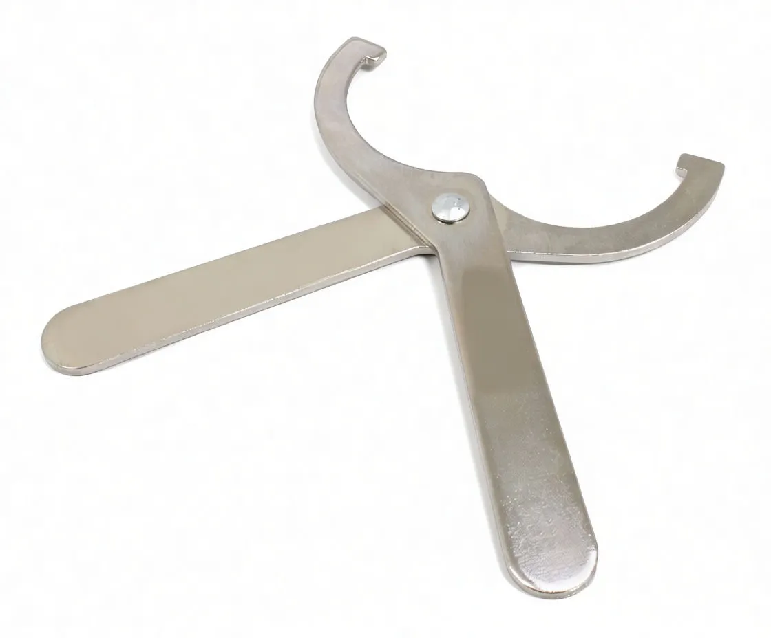 Angled view of polished metal preload spanner tool with notched U-shaped jaw and two flat handles
