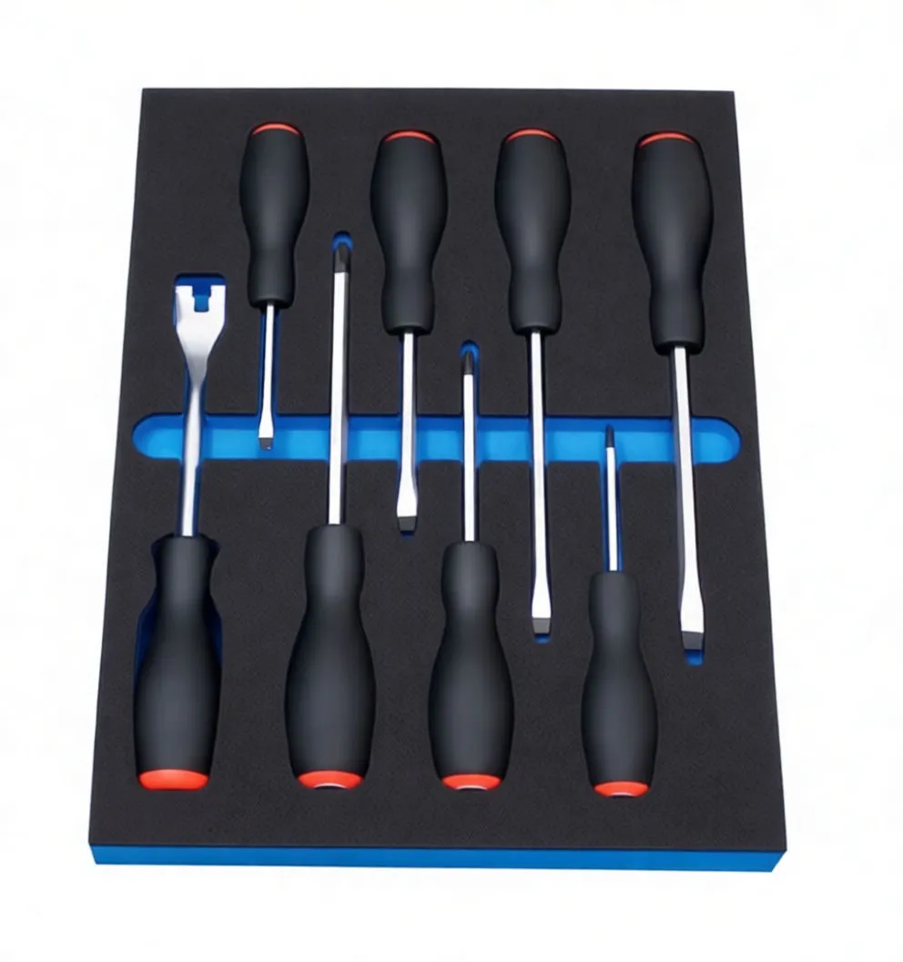 Angled perspective of ASTA screwdriver set in foam tray showing handles, chrome shafts and forked panel tool, blue base visible