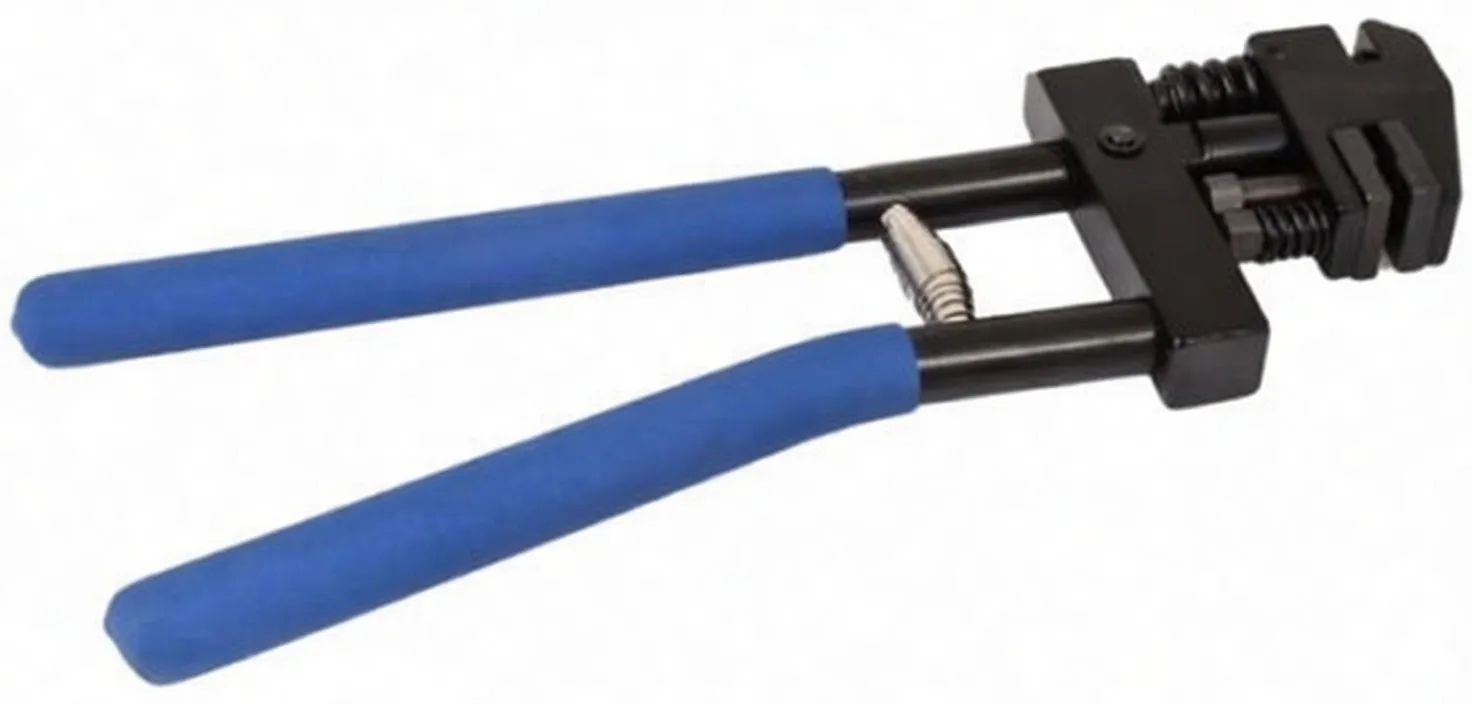 Close-up of joggler flanging and punch tool head with springs, guide rods, notched jaw and blue grips