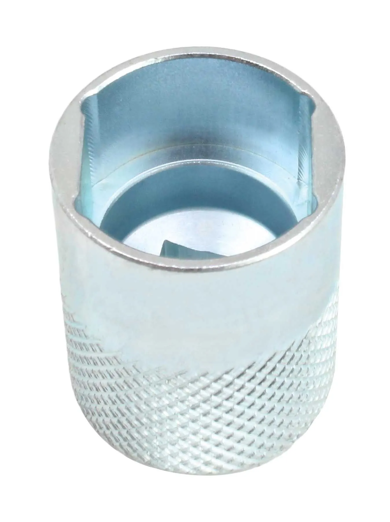 Top-down view into chrome socket showing internal notches and central raised boss with knurled outer body