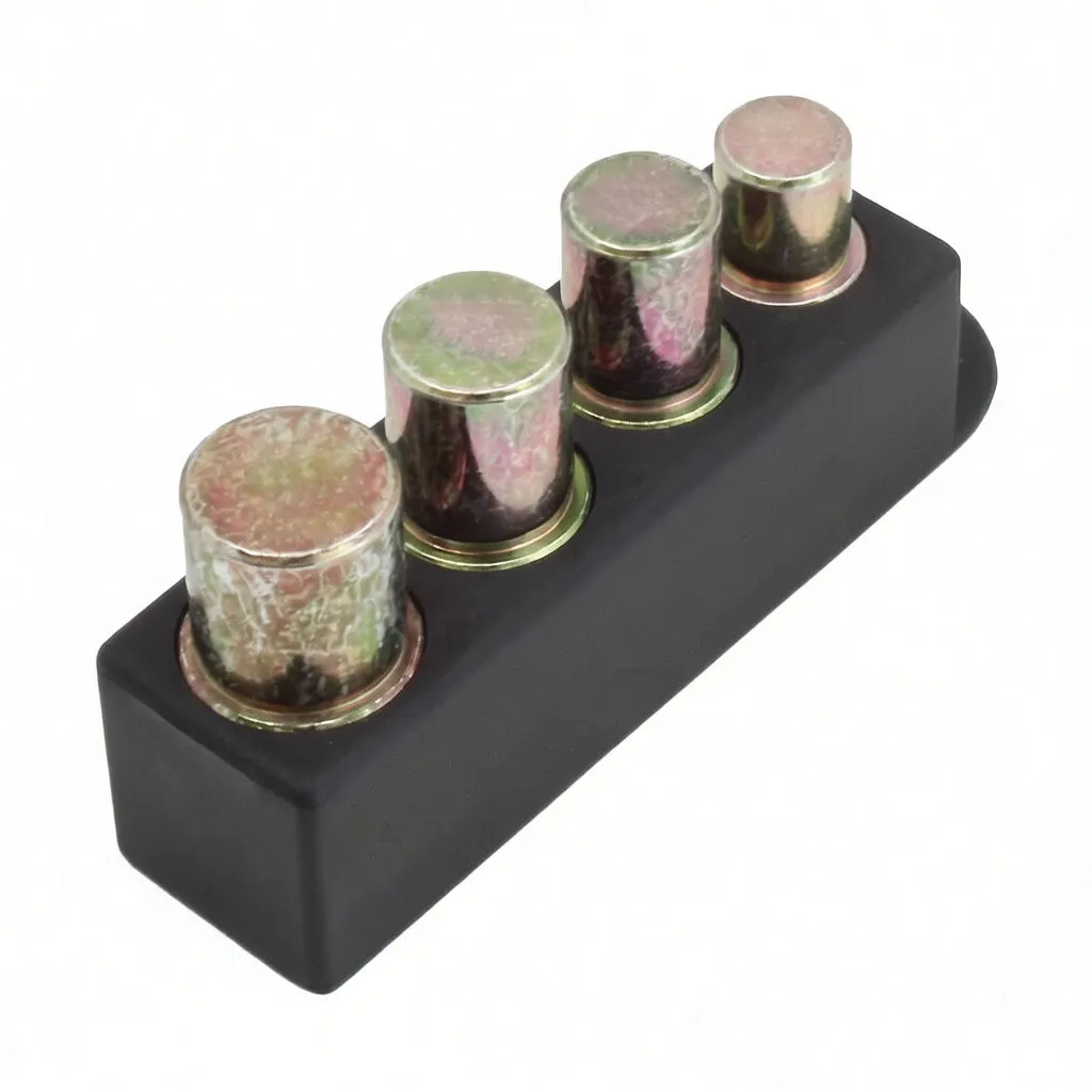 Angled view of four metal bushing drivers in a black holder with visible brand marking 'ASTA' and model code 'A-MK382'.