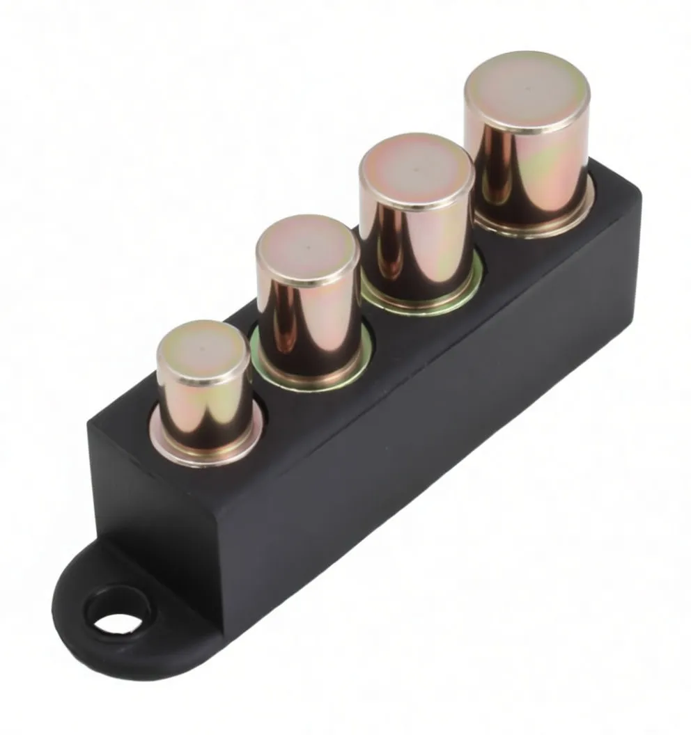 Front-top image of a four-piece shock bushing driver set in a black plastic block with ASTA logo and mounting tab.