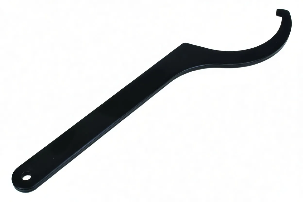 Angled view of black C-spanner with hole in handle and ASTA model marking