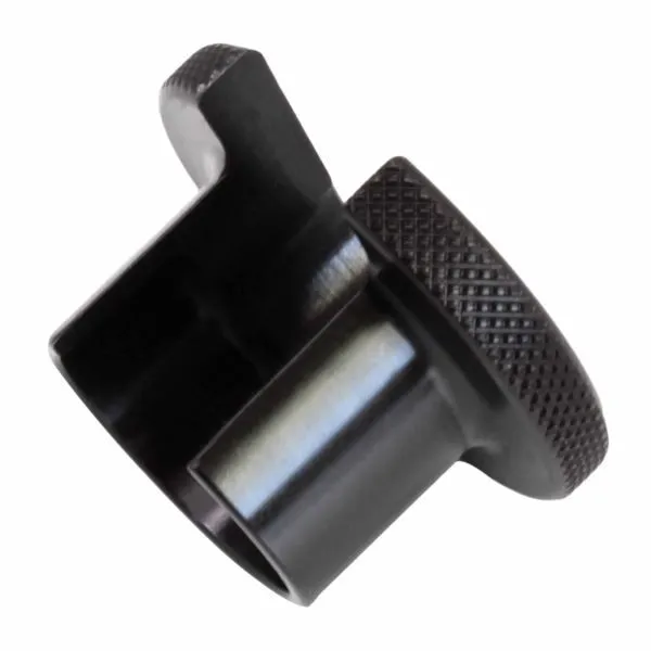 Underside angle of black shock seal head setting tool showing hollow socket, locating tab and knurled outer flange