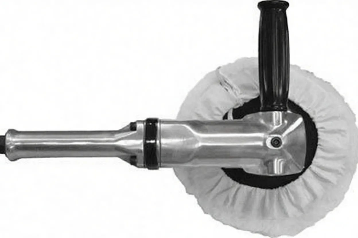 Overhead view of polisher with white bonnet, vertical handle and metal body