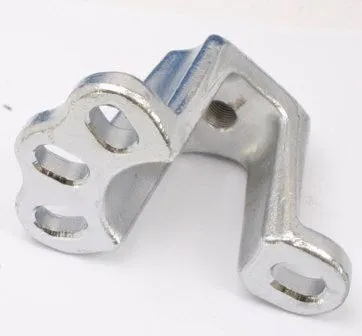 Close-up of L-shaped silver puller adapter with three oval slots and a threaded hole, bright zinc finish.