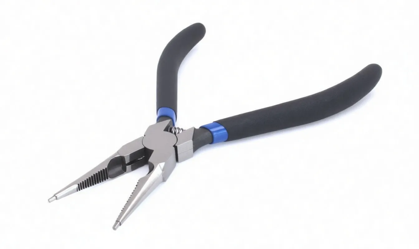 Angled close-up of snap ring pliers jaws, pivot with spring and stamped marking, black foam handles