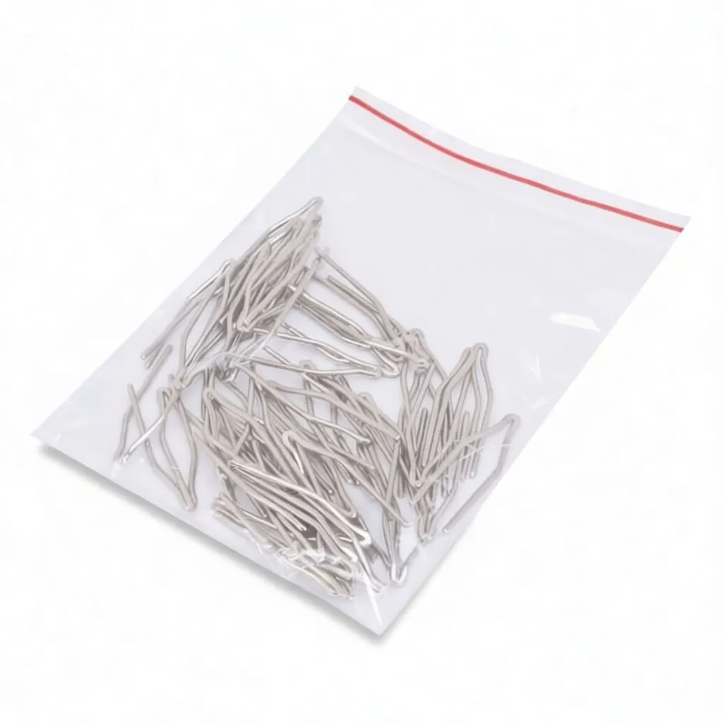 Resealable plastic bag with many silver flat tip parts and a SaTra label with barcode