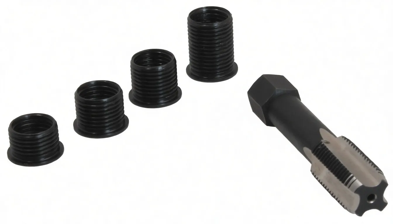 Four threaded spark plug inserts in a row with a horizontal M14x1.25 tap tool