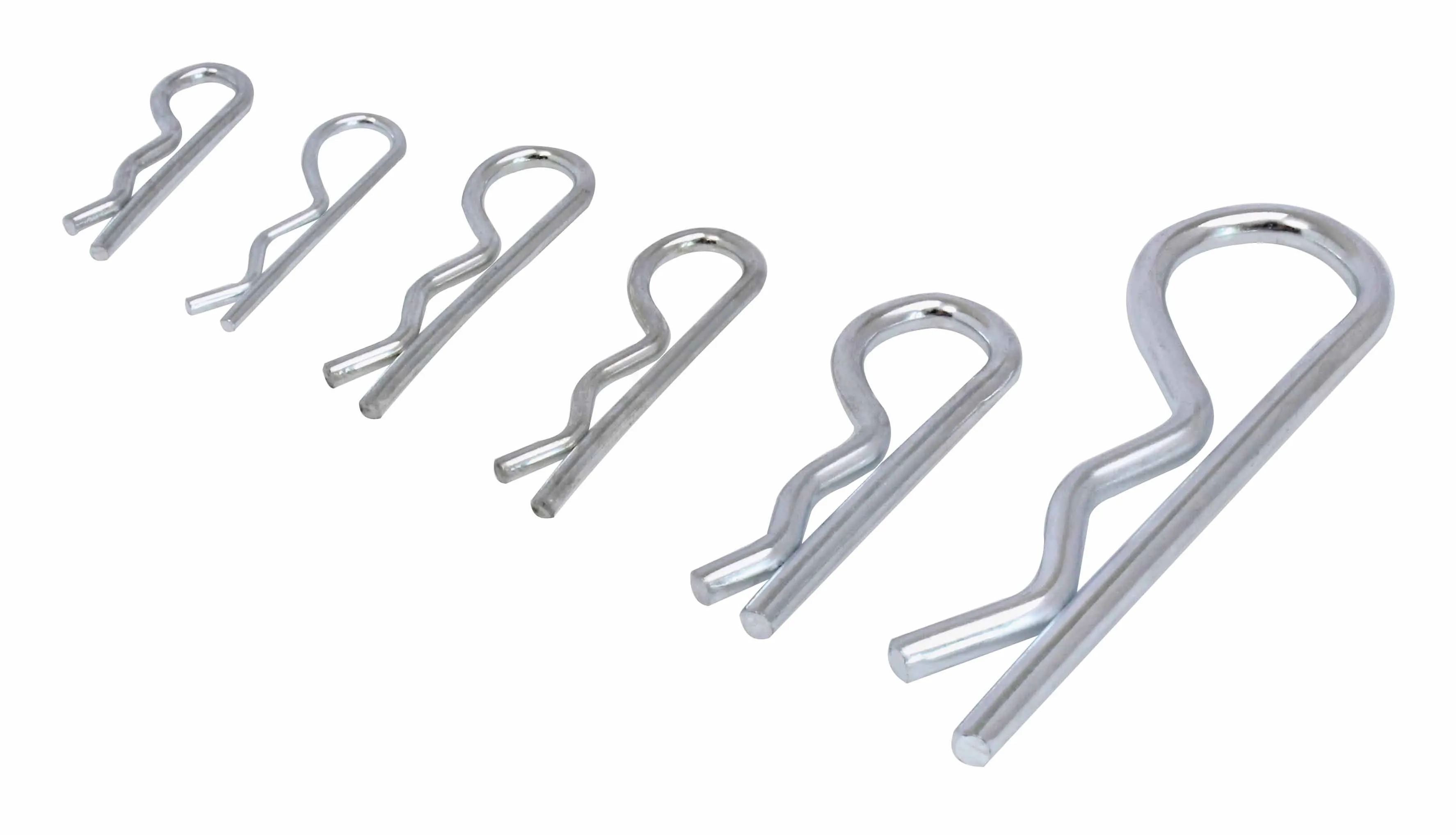 Row of individual shiny metal R-clips in increasing sizes on white background, showing loop head and wavy leg