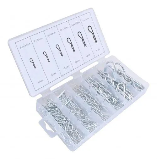 Angled shot of a plastic case holding various sizes of shiny metal R-clips with size labels on the lid