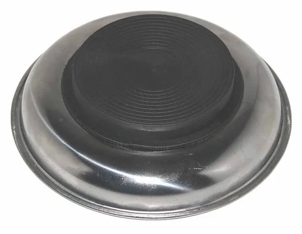 Underside of stainless parts tray with a black circular rubber-coated magnet pad with concentric ridges.