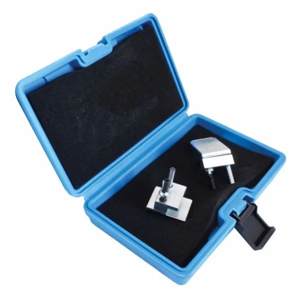 Perspective view of open blue case with two metal belt-removal fixtures in foam and an open latch.