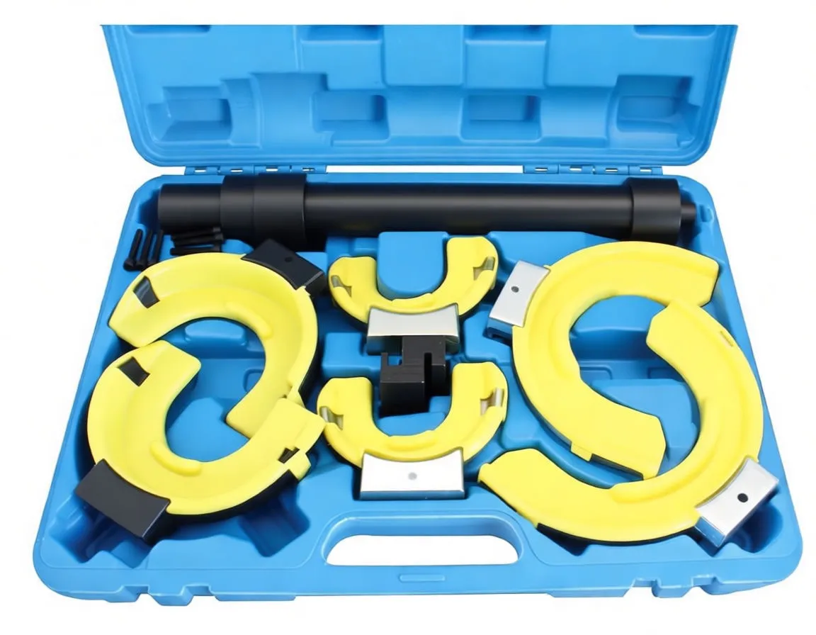Laid-out spring compressor kit: black compressor tube, six yellow clamp halves, two adapters and six bolts