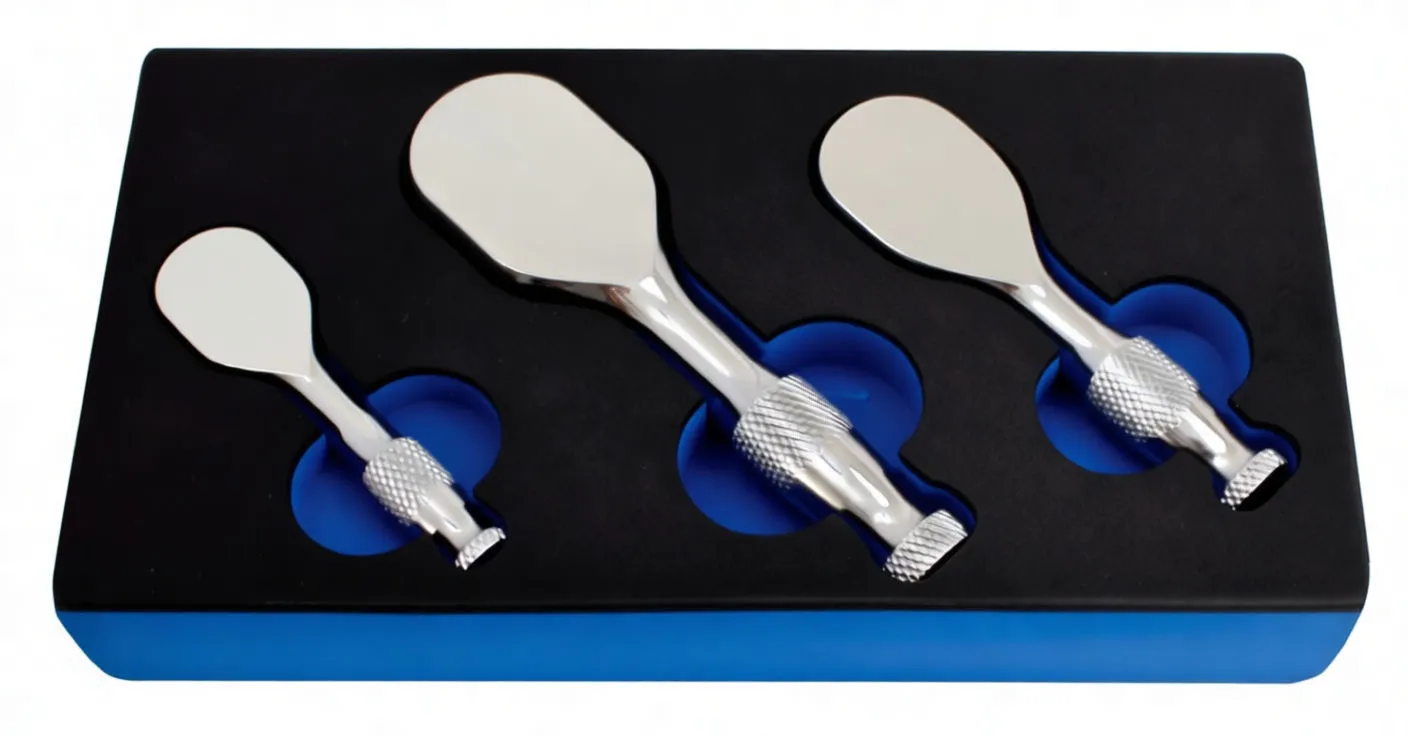 Rear view of three stubby ratchets showing square drives, retaining balls and knurled chrome handles