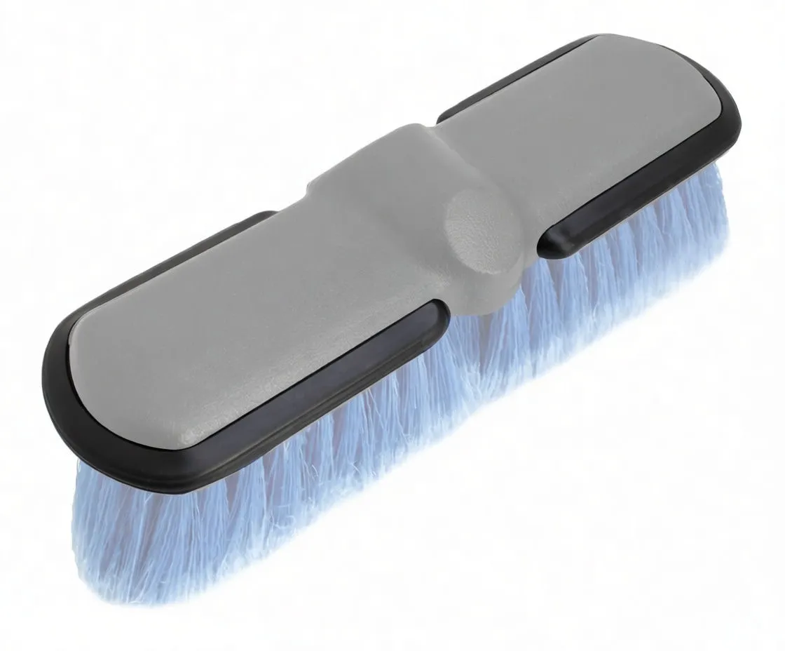 Alternate angle of brush showing blue bristle pad, black head and telescoping silver pole with foam grip