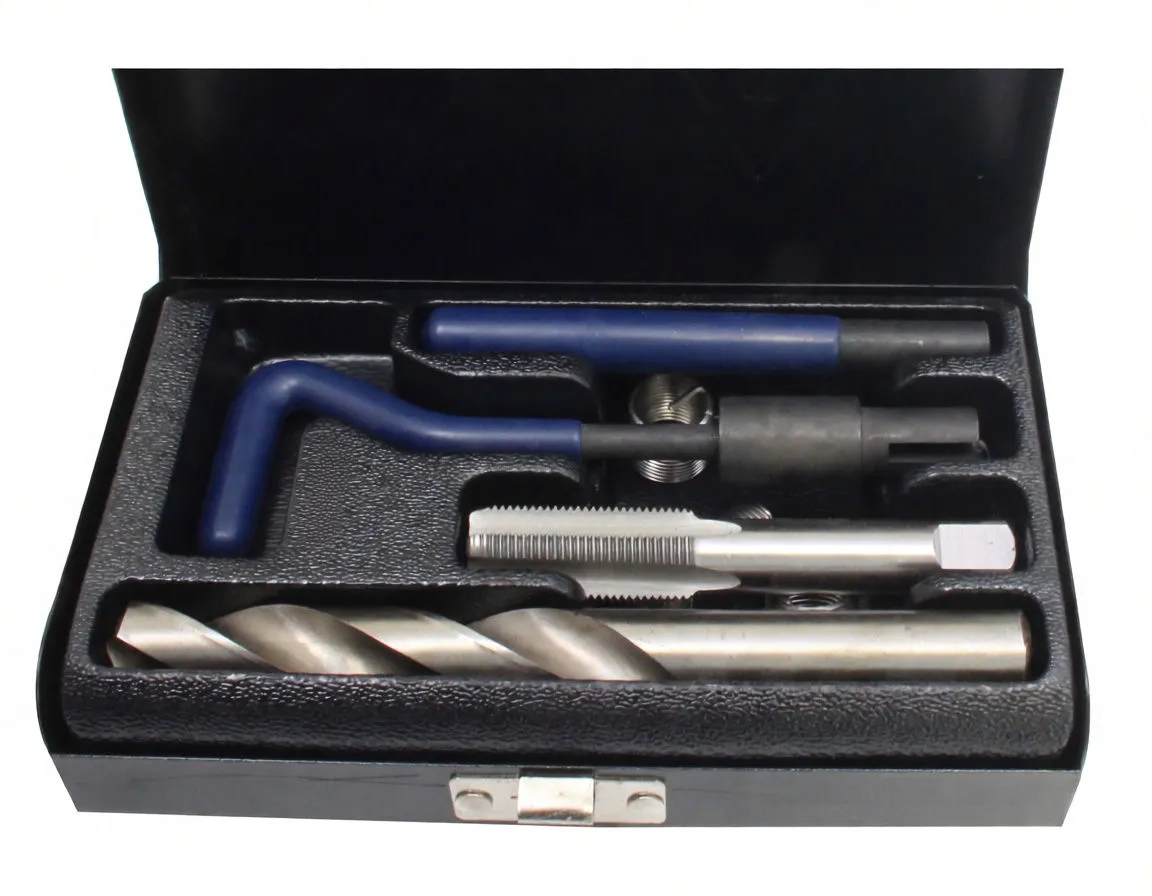 Close top view of thread repair kit in black case showing drill, tap, helicoil insert, black adapter and blue installation tools, with M14X1.25 printed on foam.