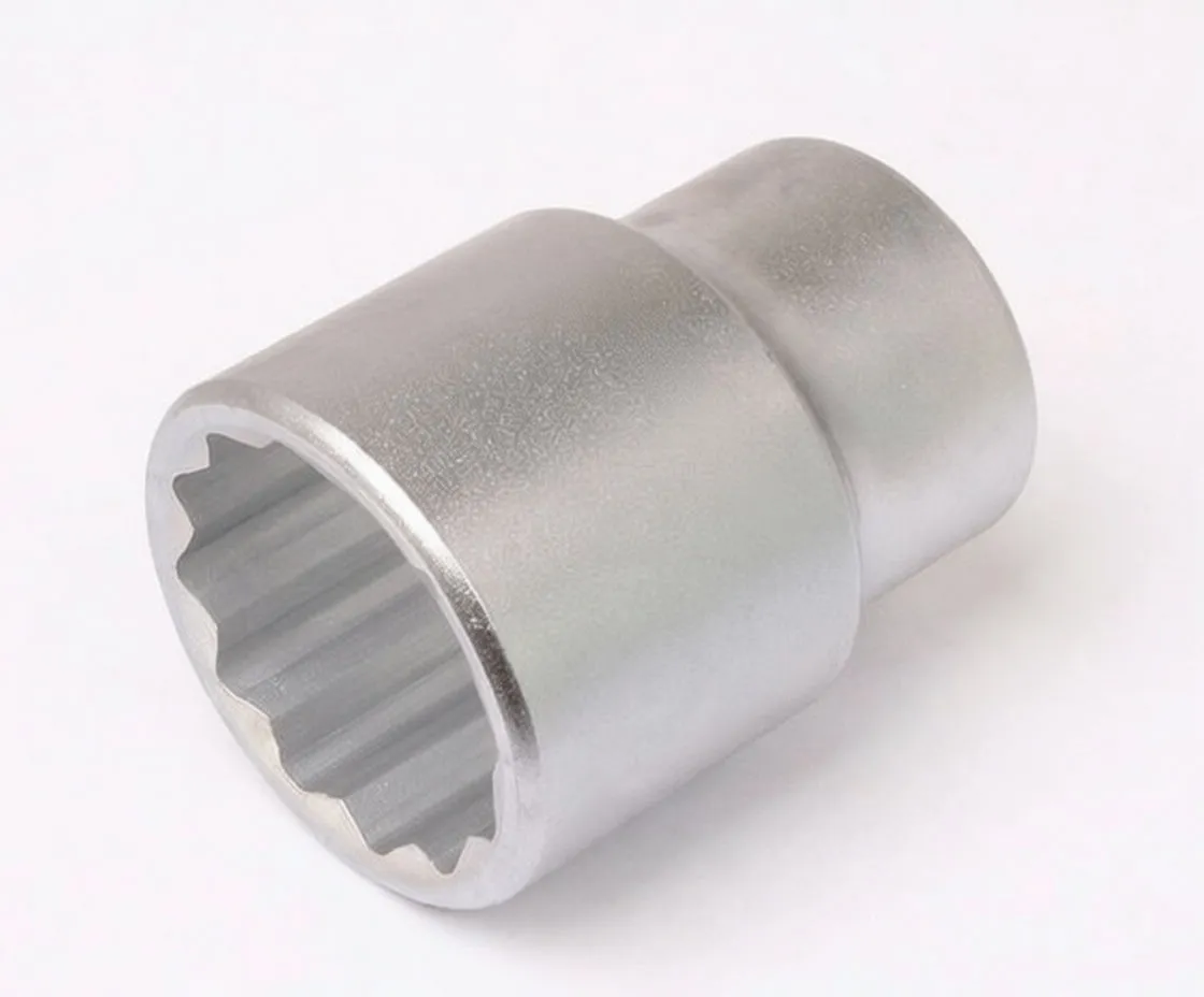 Top-down oblique image of a 3/4 inch 12-point short socket showing the 12-point interior and the embossed marking on the outer body.