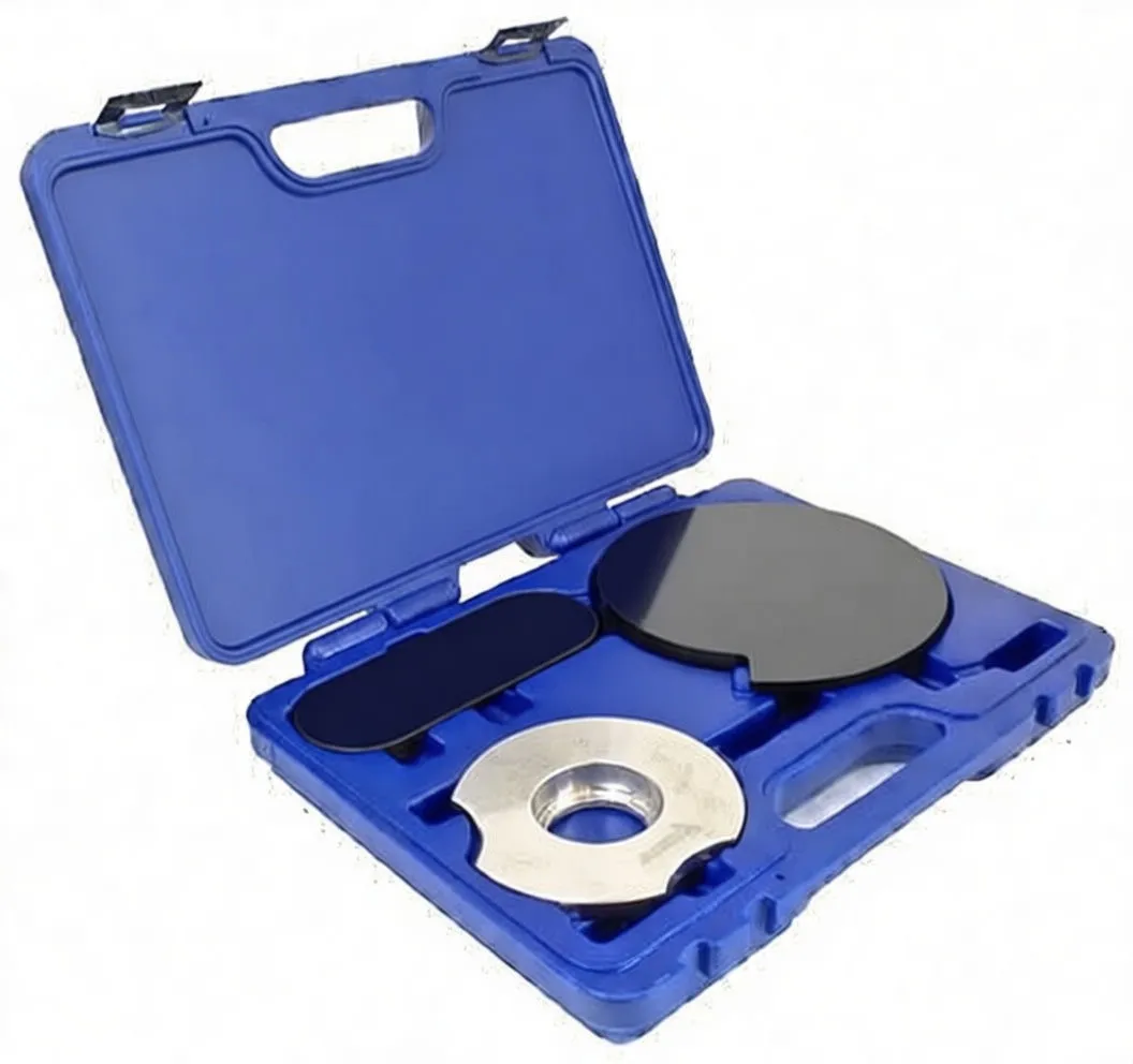 Close-up of black circular timing plate with central hole, scale markings and mounting screws