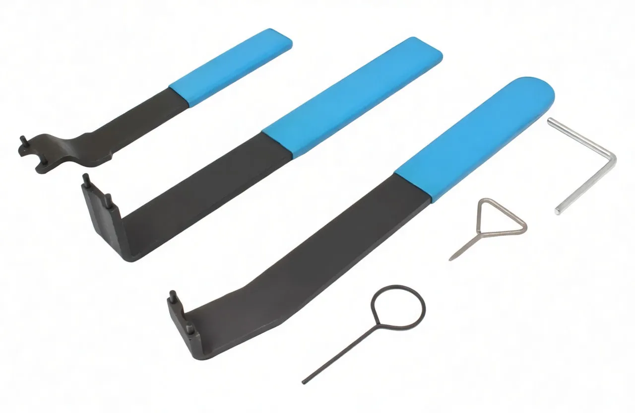 Three black-and-blue tensioner tools and three small metal pins and hex key laid out on white