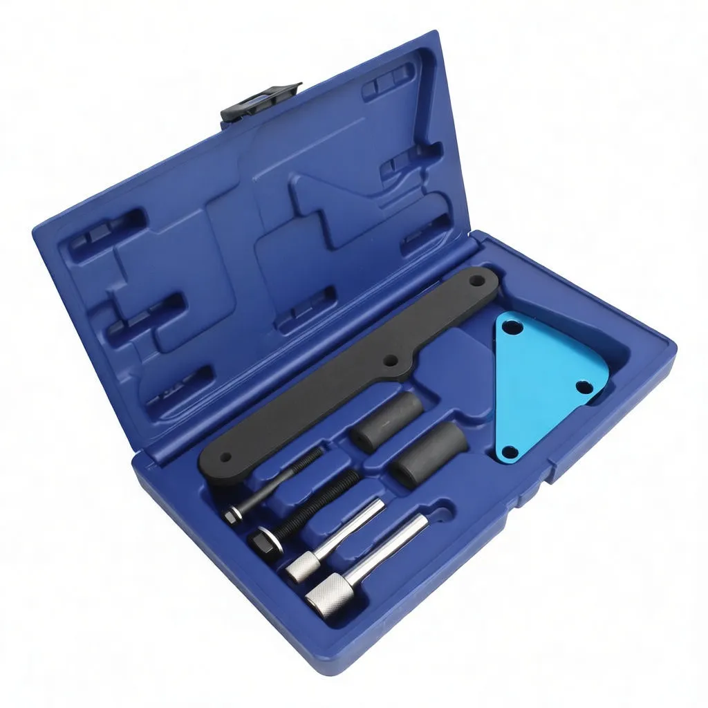 Angled view of blue case holding timing kit: ASTA black bar, blue camshaft lock plate, bolts, rubber sleeves and knurled alignment pins with yellow label in lid