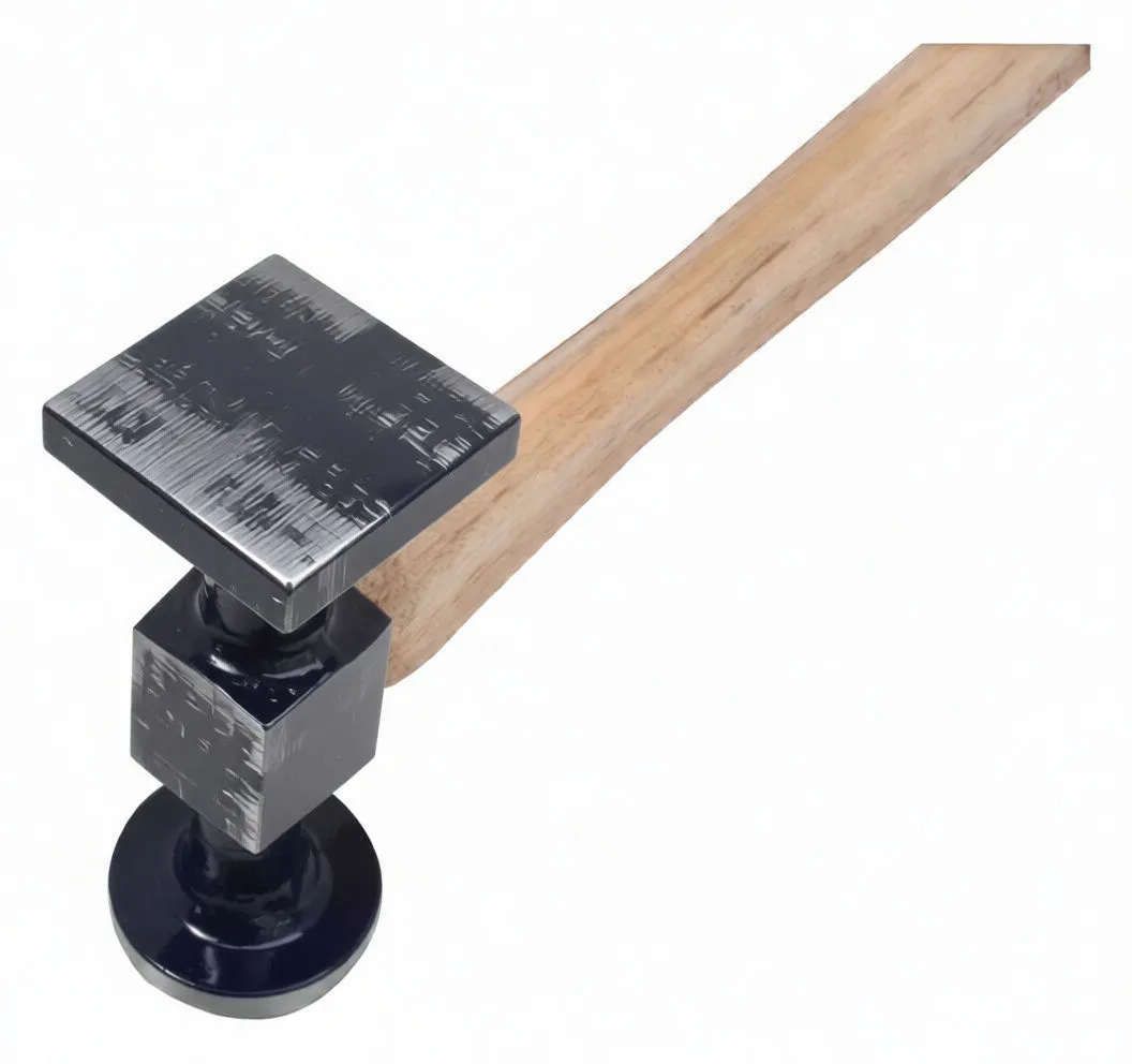 Close-up of textured square face and round face on tinsmith's hammer, cube boss with wood plug and stamped marking