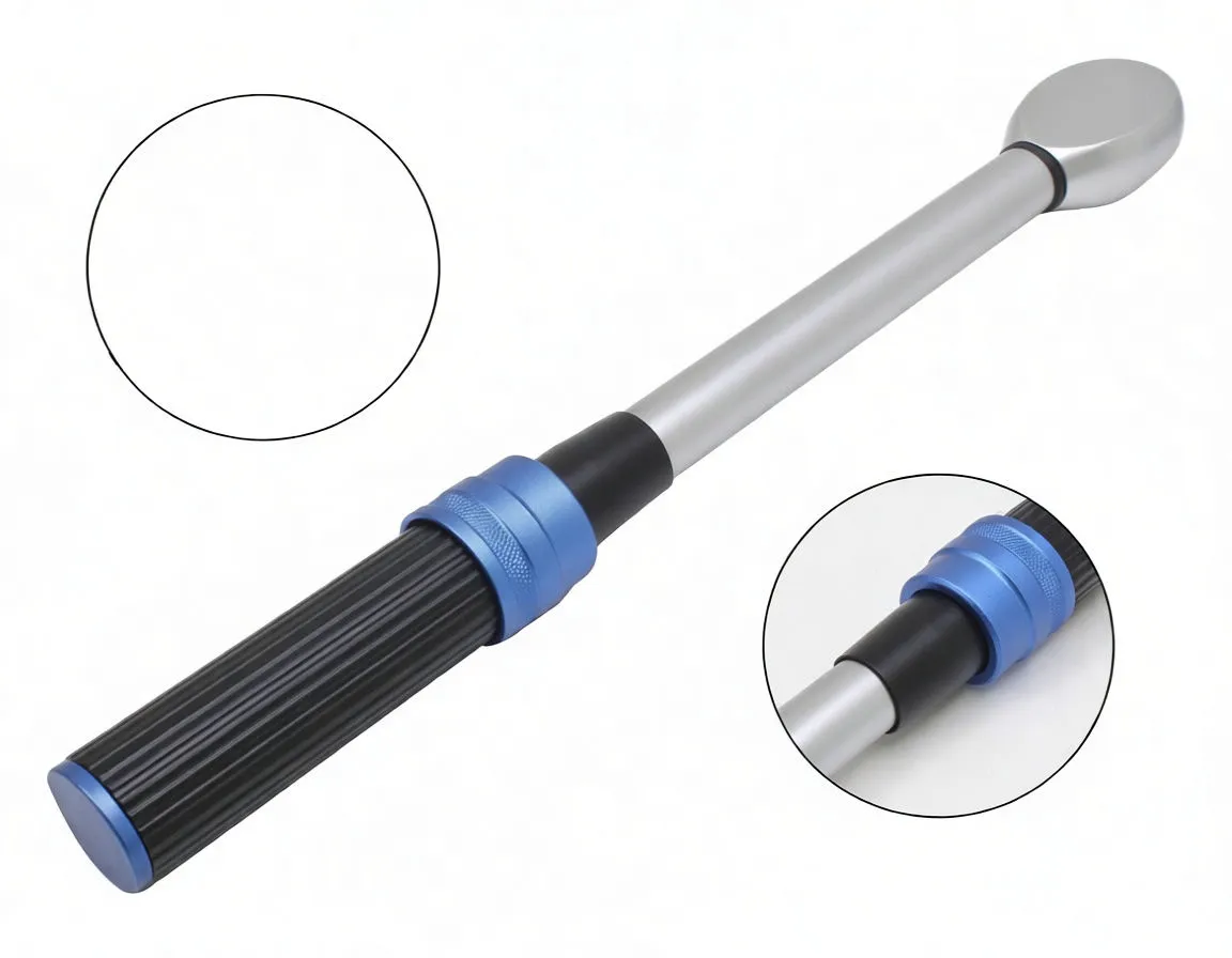 Close-up of torque wrench handle, blue collar, adjustment scale and ratchet head inset