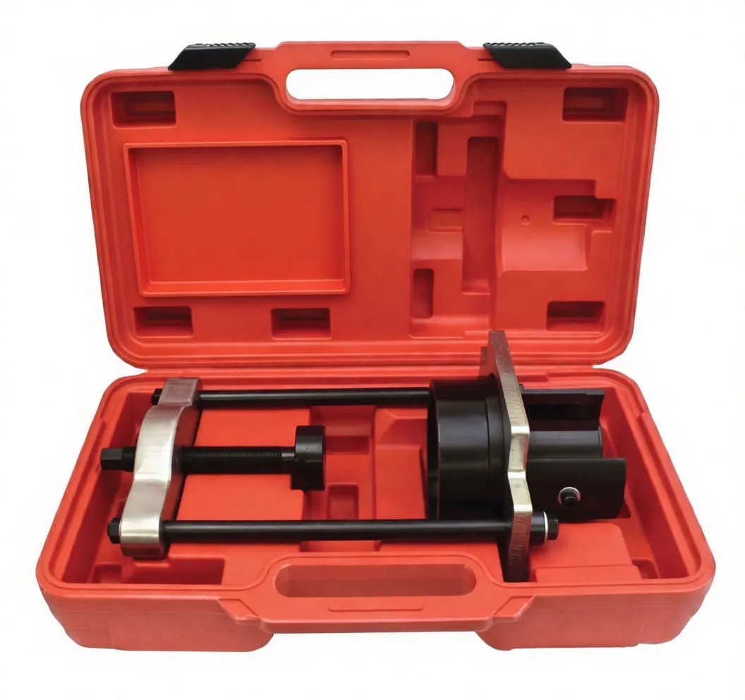 Close-up of trailing arm bush press tool showing slotted black adapter cup, threaded push bolt, guide rods and silver crossheads