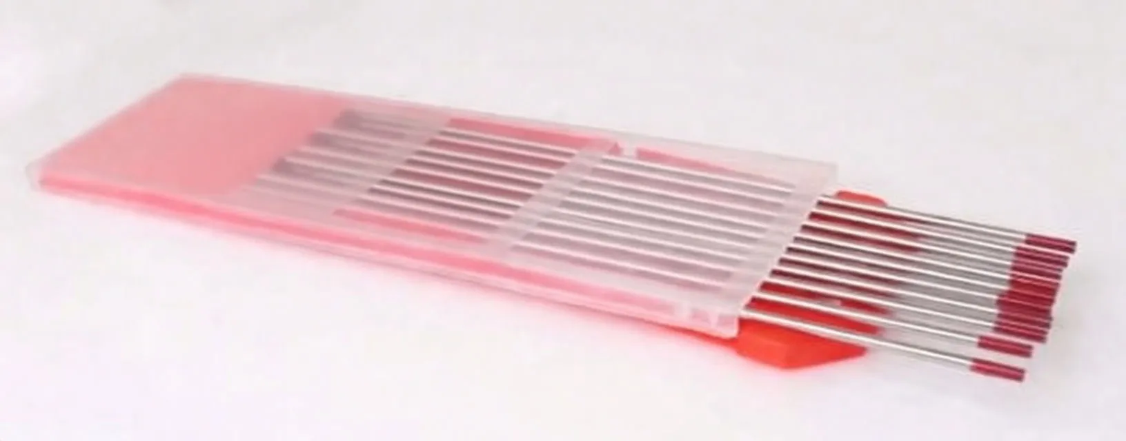 Angled view of open red pack with tungsten electrodes partly slid out showing red tips and label