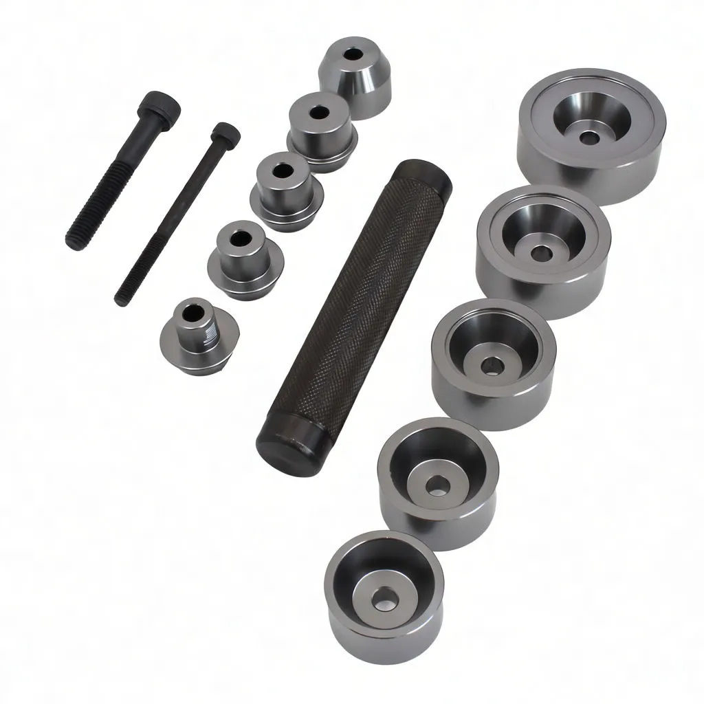 Bearing driver set components laid out: knurled handle, six driver cups, smaller adapters, two bolts and two silver tapered mandrels on white background.