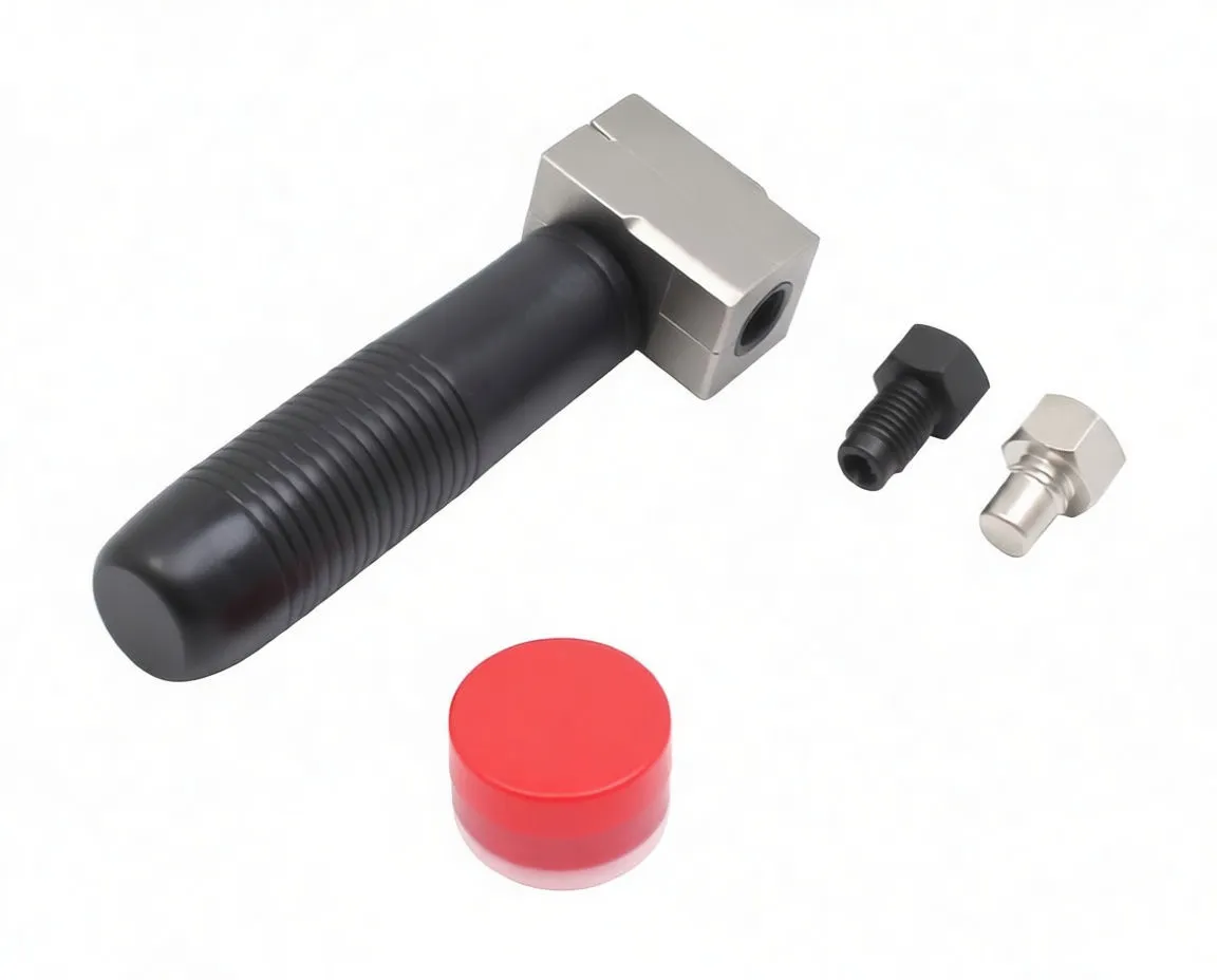 Top view of flaring tool with metal head, two punches and pot of special punch grease