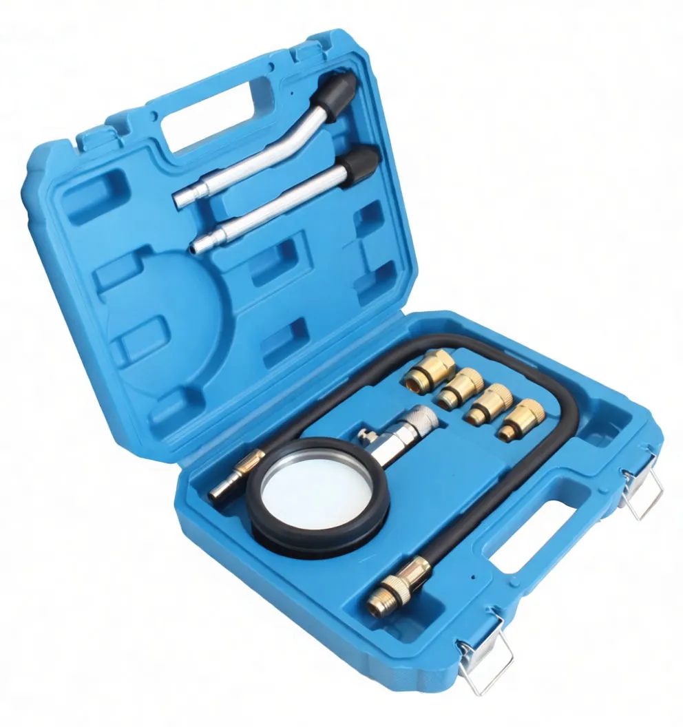 Angled view of blue case containing compression tester gauge, hose, brass fittings and two metal probe extensions
