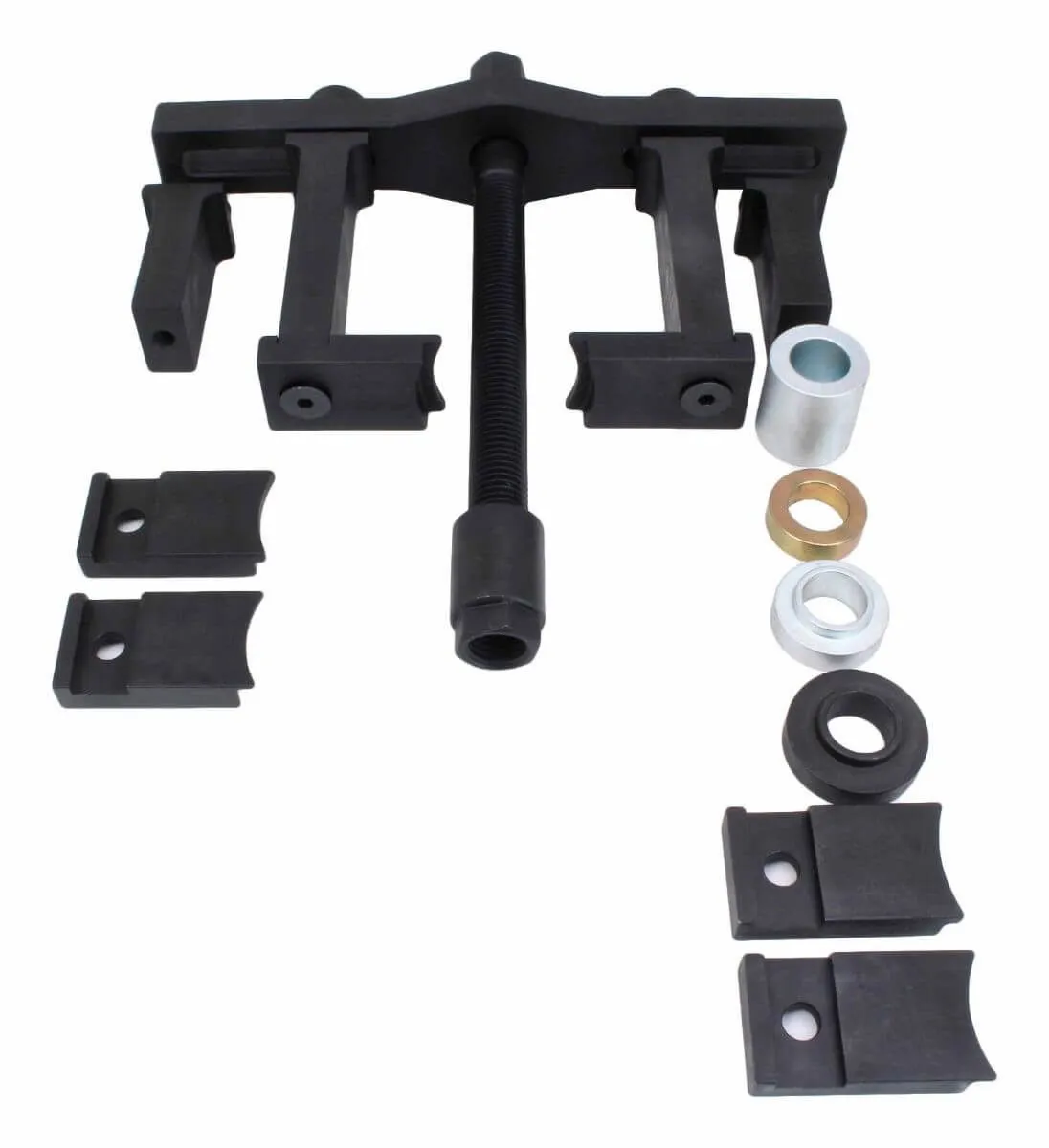 Universal hub puller yoke, threaded screw, jaw adapters and metal sleeves arranged on white background