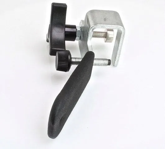 Angled shot of wiper arm puller showing threaded screw, metal tip and plastic adjustment knobs