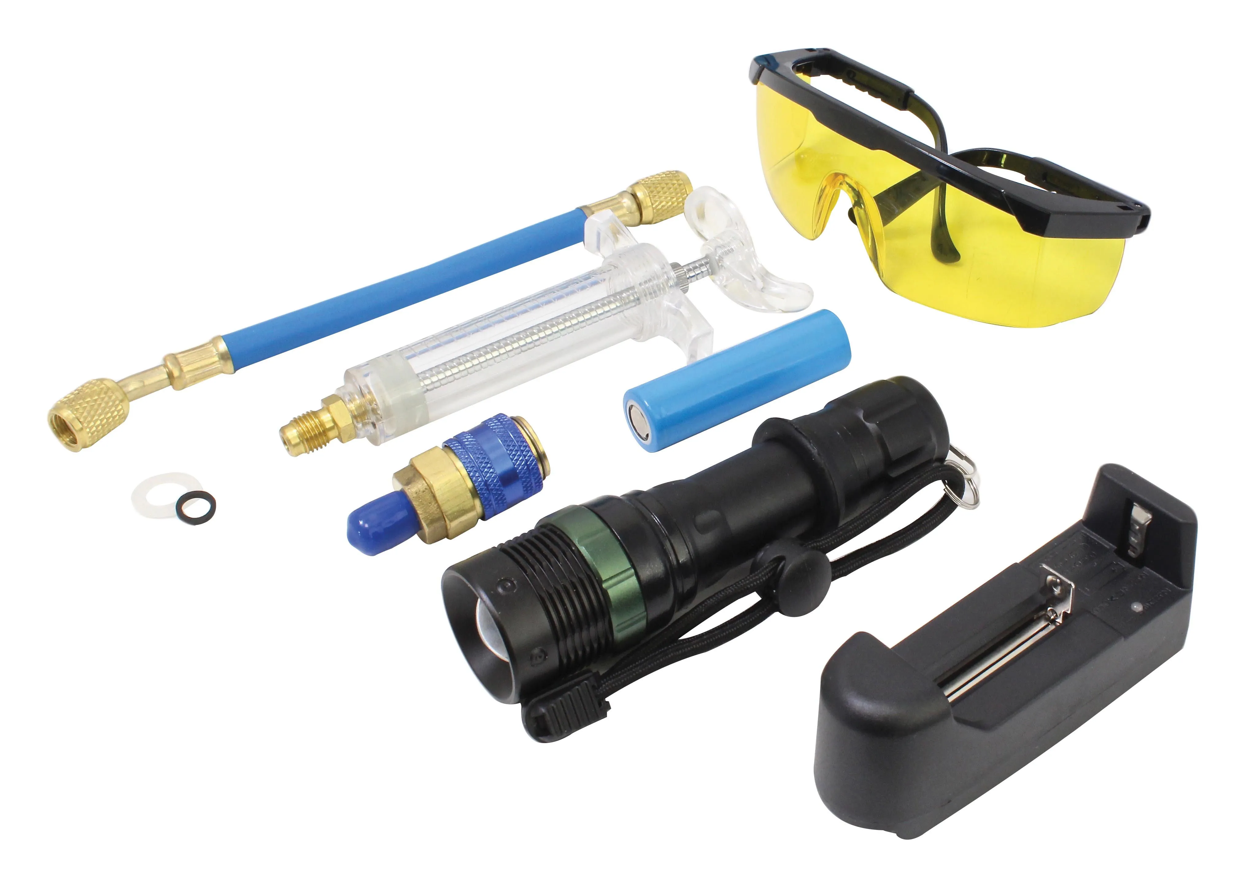 UV leak detection kit components laid out: goggles, UV flashlight, battery, syringe injector, hose and charger