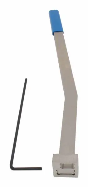 Close-up of tensioner lever tip with alignment tabs and through-hole, rectangular adapter block with slots, and hex key beside it