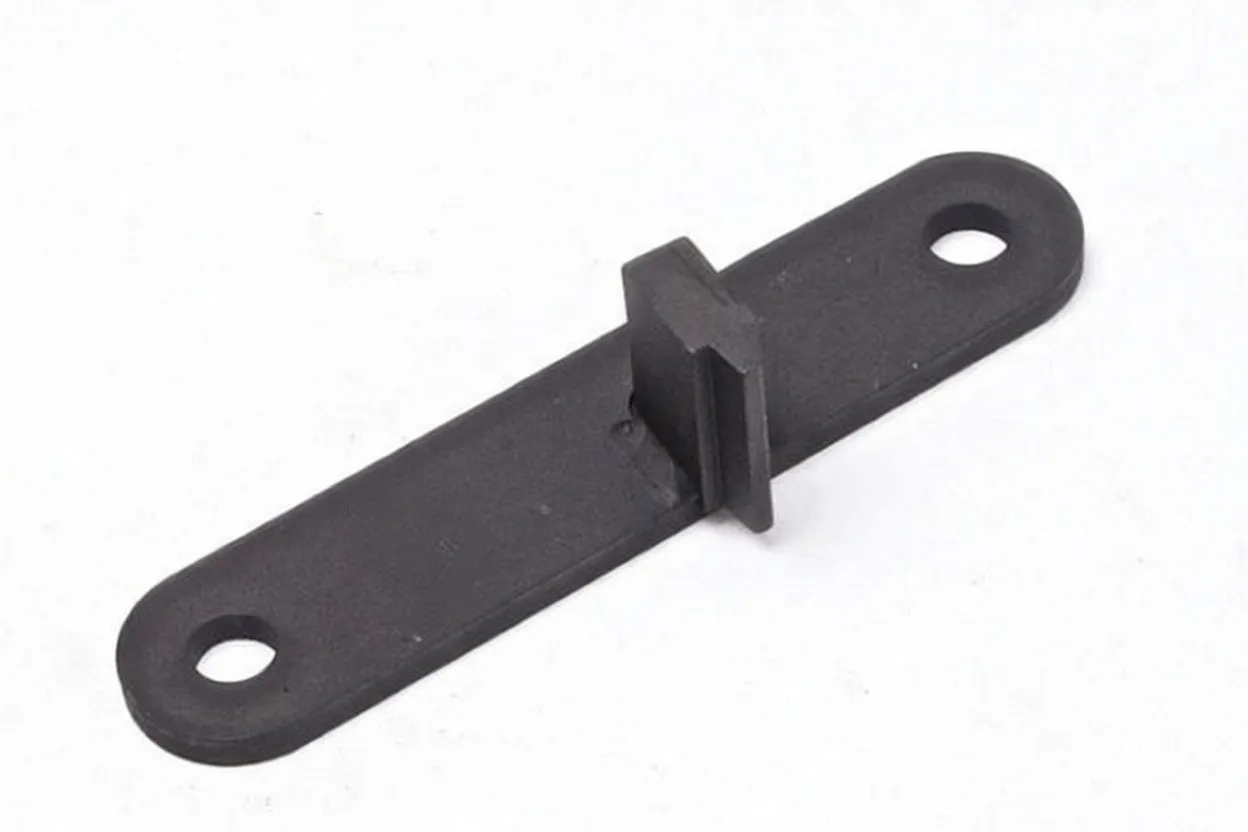 Flat black timing bracket with two end holes, central raised tab and ASTA logo