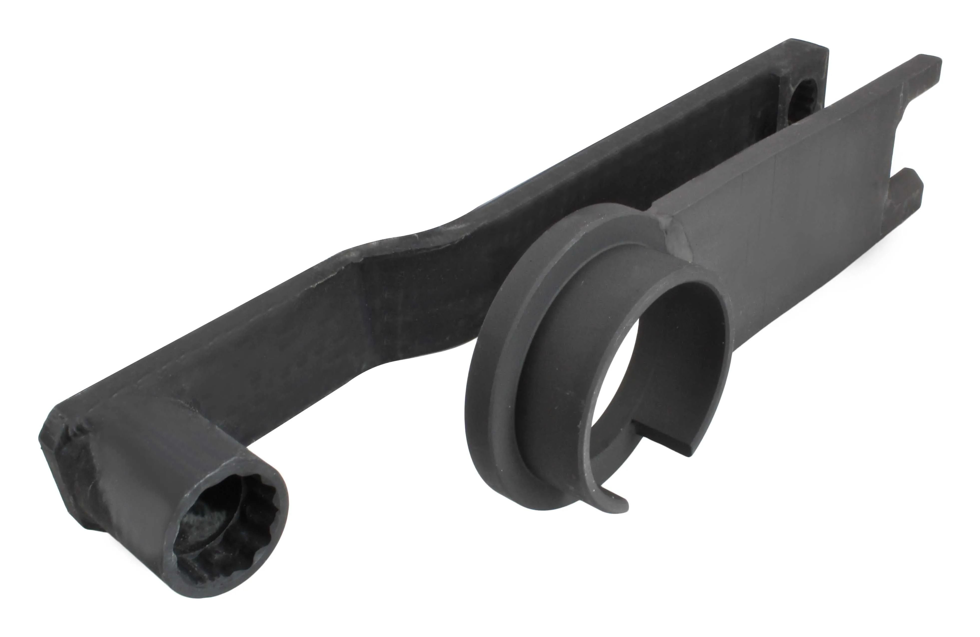 Close-up of splined socket on a black lever tool and circular clipped ring on the mating key, showing internal tabs and matte finish