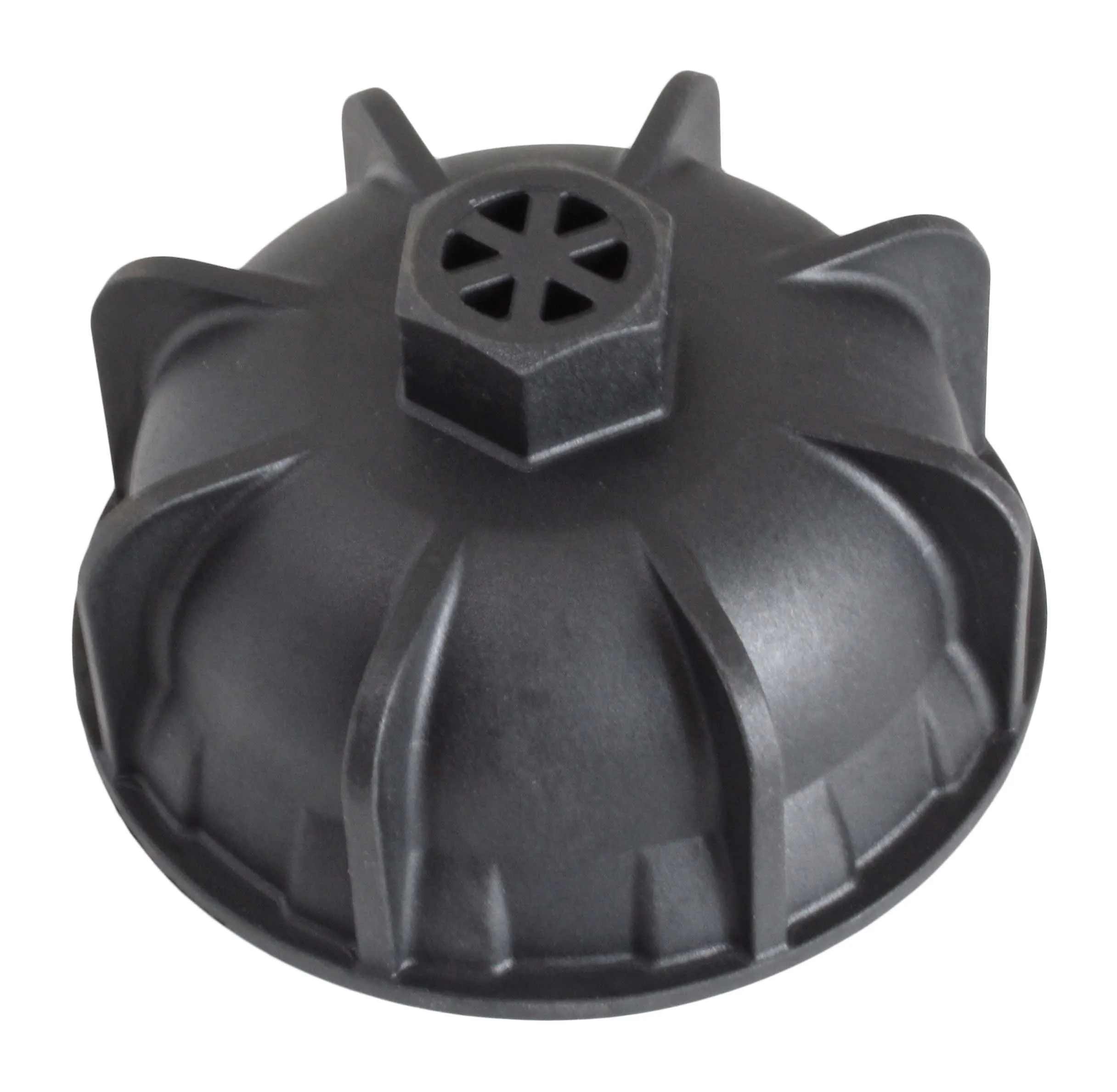 Top exterior of domed black plastic cap wrench with radial fins and hexagonal drive boss