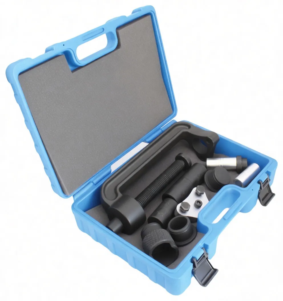 Top view of open blue case showing organized wheel stud press components: threaded screw, C-frame, adapter cups, silver pins and triangular plate